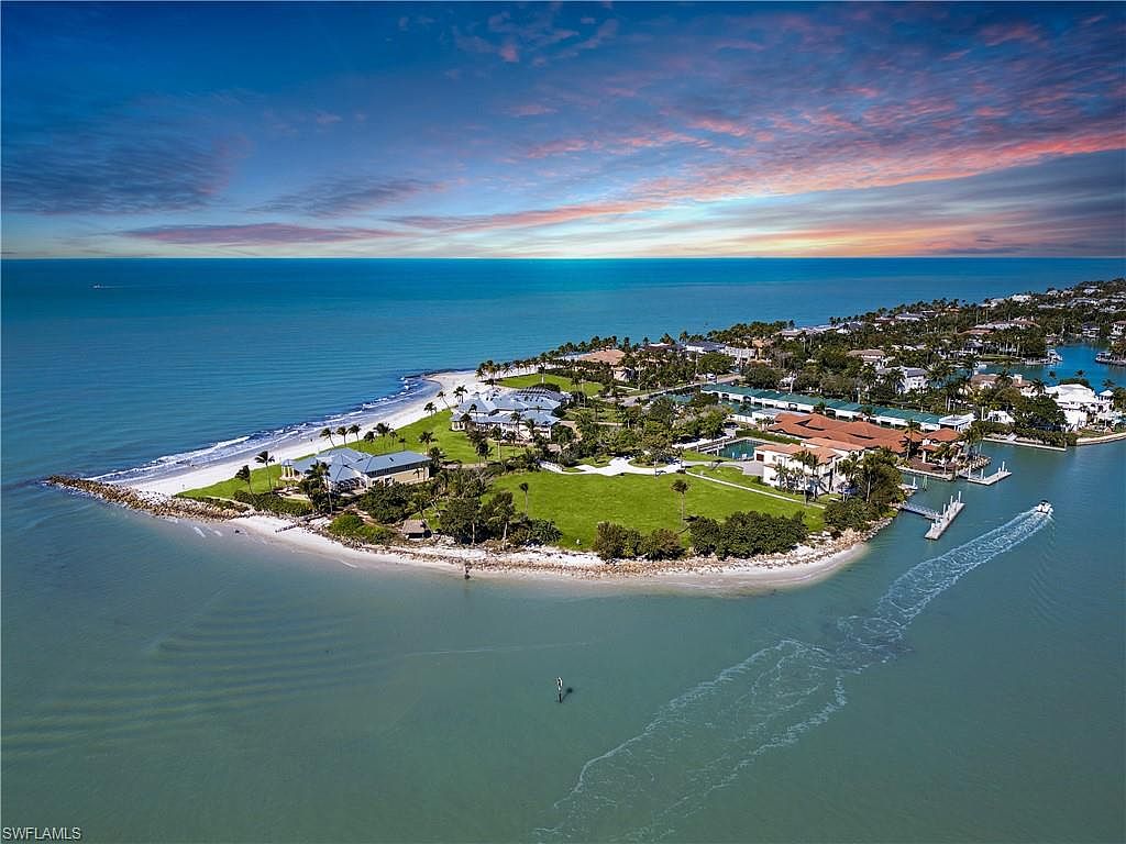 Aerial view of Gordon Pointe $295 million Naples Florida waterfront estate with main residence and guest houses